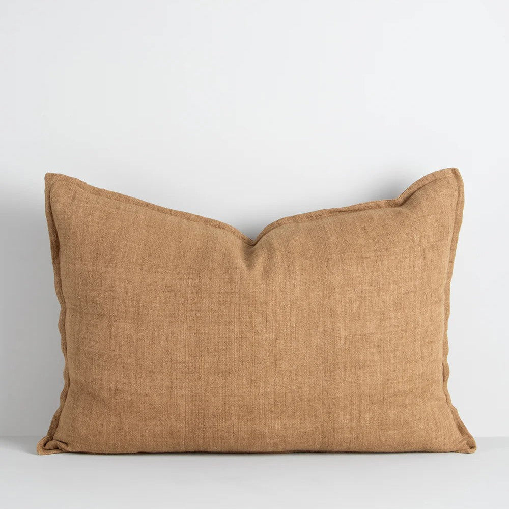 Cumin linen cushion on a white background