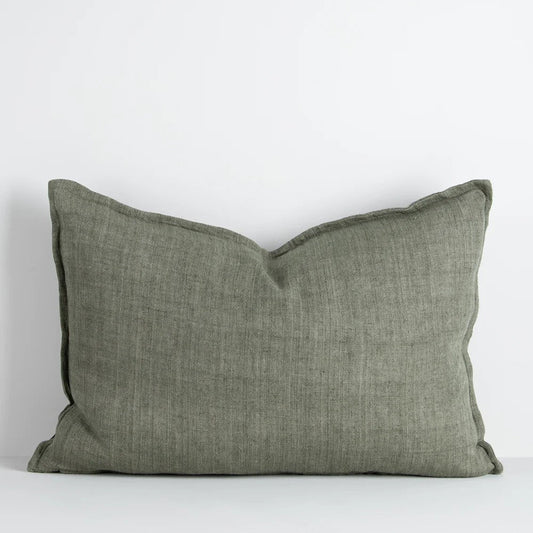 Moss green linen cushion on a white background