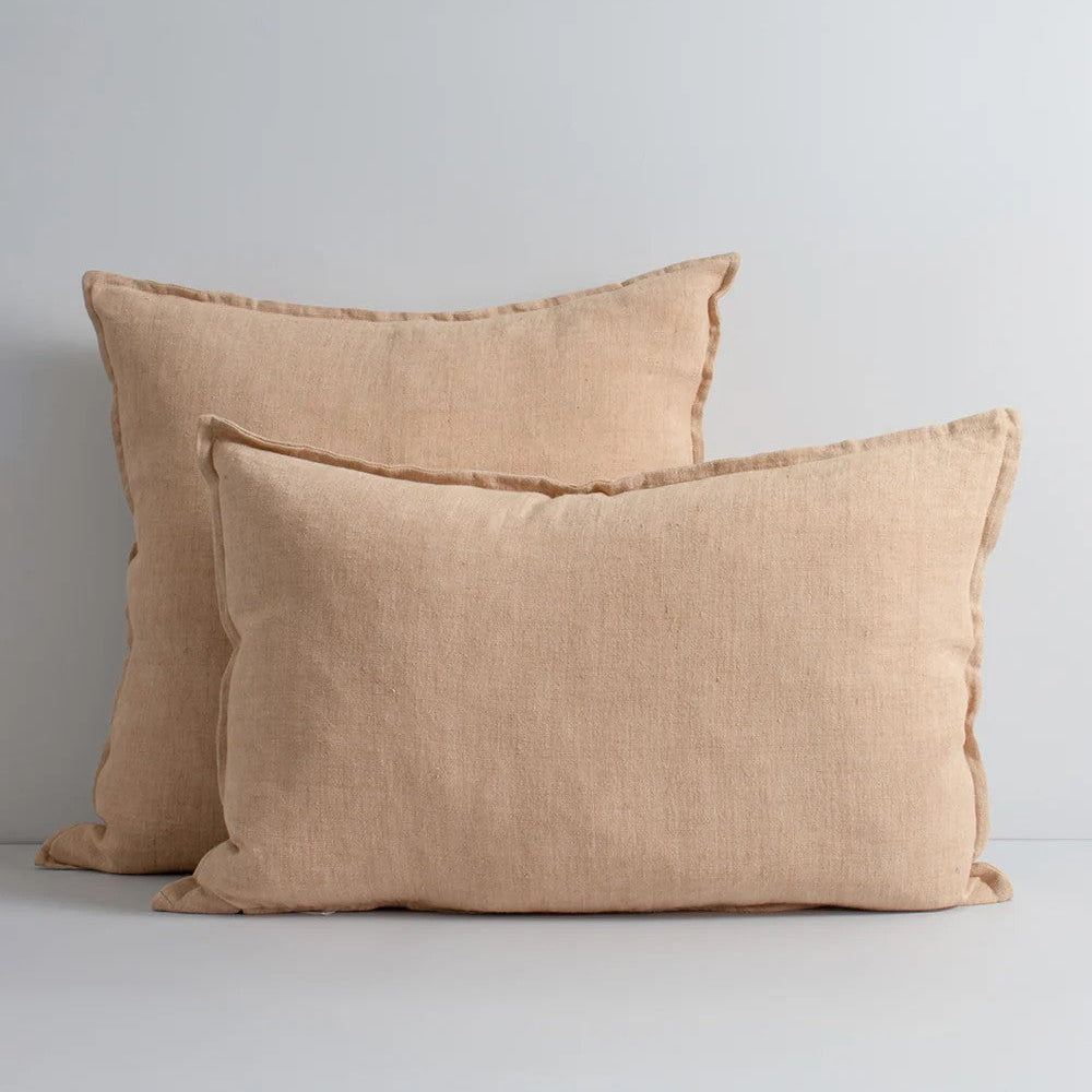 Two coconut linen cushions on a white background