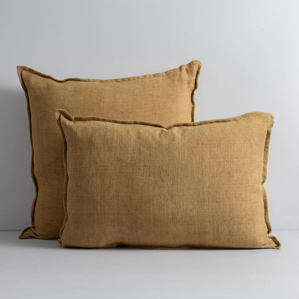2 Cumin linen cushions on a white background