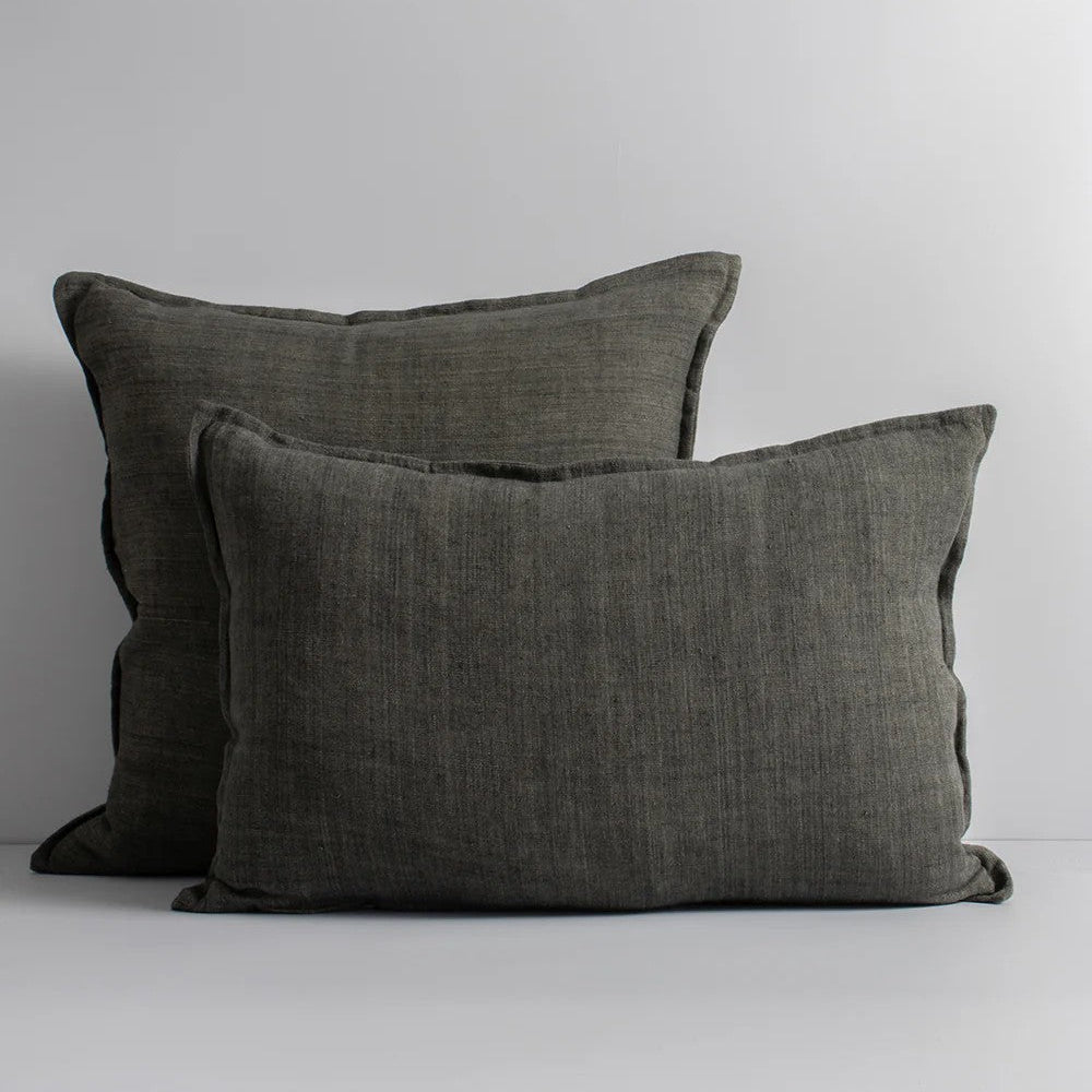 Two slate grey cushions on a white background