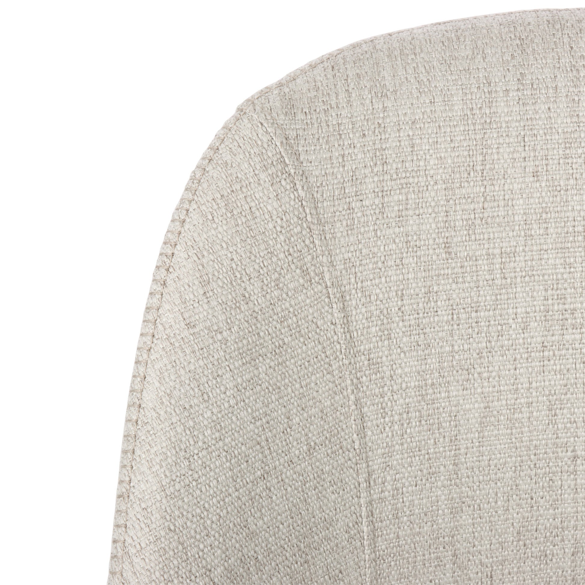 Close-up of a textured beige chair backrest on a white background