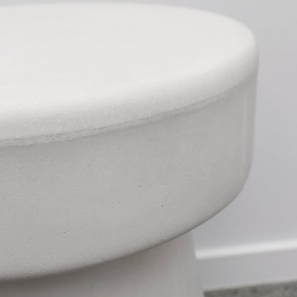 Close-up of a white concrete mushroom stool    