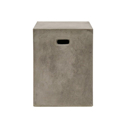 Concrete cube-shaped side table on a white background