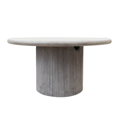Round marble table with a textured cylindrical base on a white background