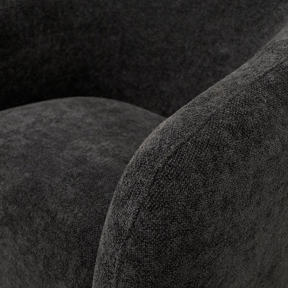 Close-up of a textured black fabric on a swivel armchair 