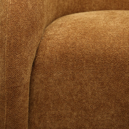 Close-up of ginger textured fabric on a swivel armchair 