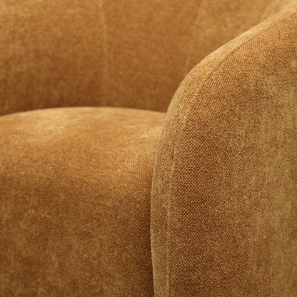 Close-up of ginger textured fabric on swivel armchair 