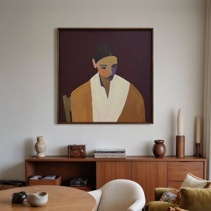 Living room with a painting of a woman on the wall, wooden sideboard, and furniture.