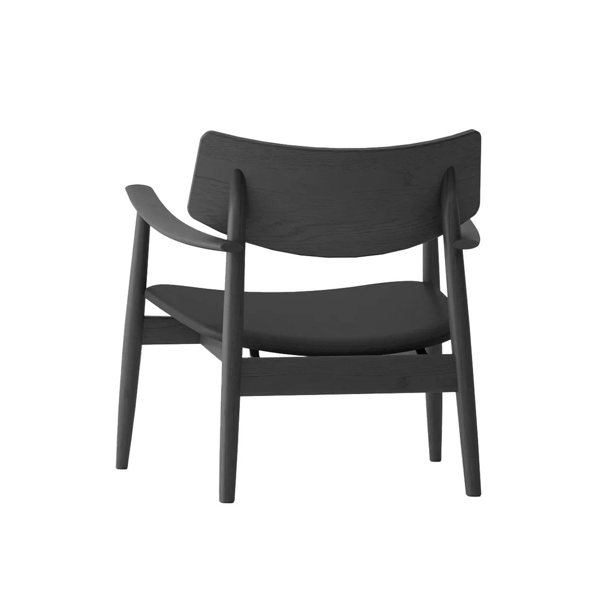 Back detailing of black occasional chair on a white background