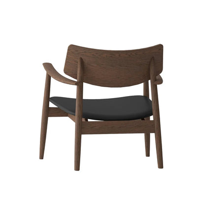Walnut coloured chair with a black seat on a white background
