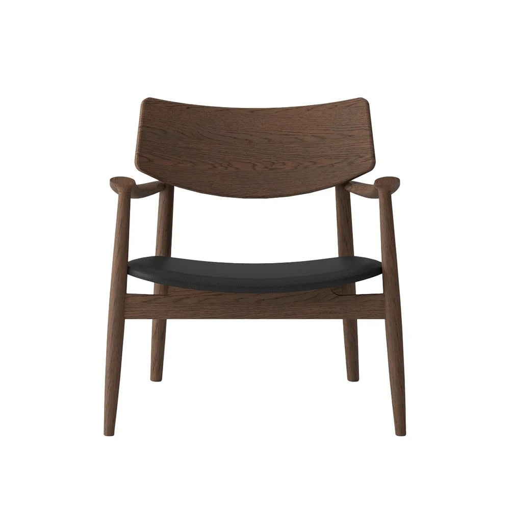 A mid-century modern wooden armchair with a curved backrest, dark brown wood frame, and a black upholstered seat cushion, shown against a plain white background.