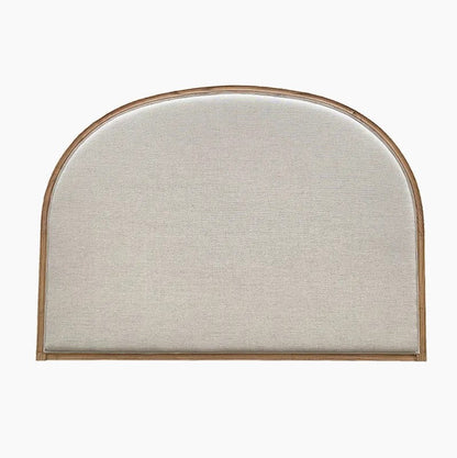 An upholstered headboard with a curved top and a light natural wood frame, shown against a plain white background.