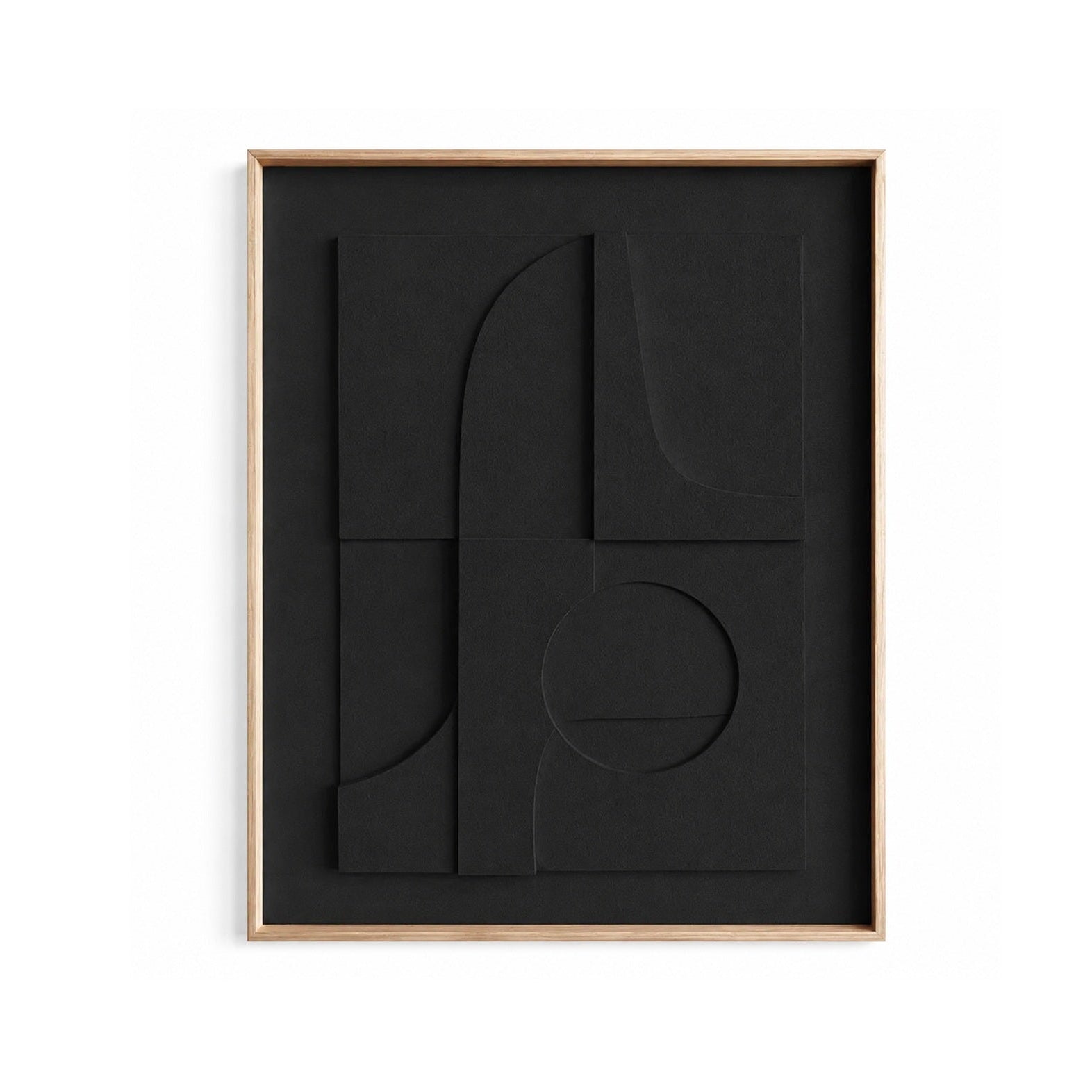 Abstract black wall art with layered geometric shapes and a light wood frame, shown against a plain white background.
