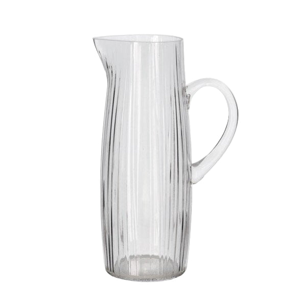 Clear glass pitcher on a white background
