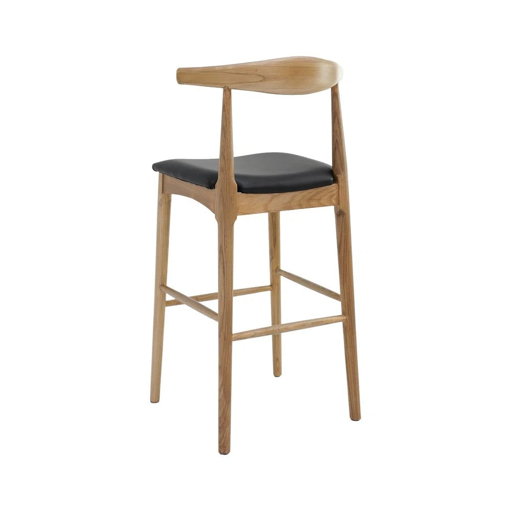 A modern wooden bar stool with a curved backrest, natural oak legs, and a black cushioned seat, shown against a plain white background.