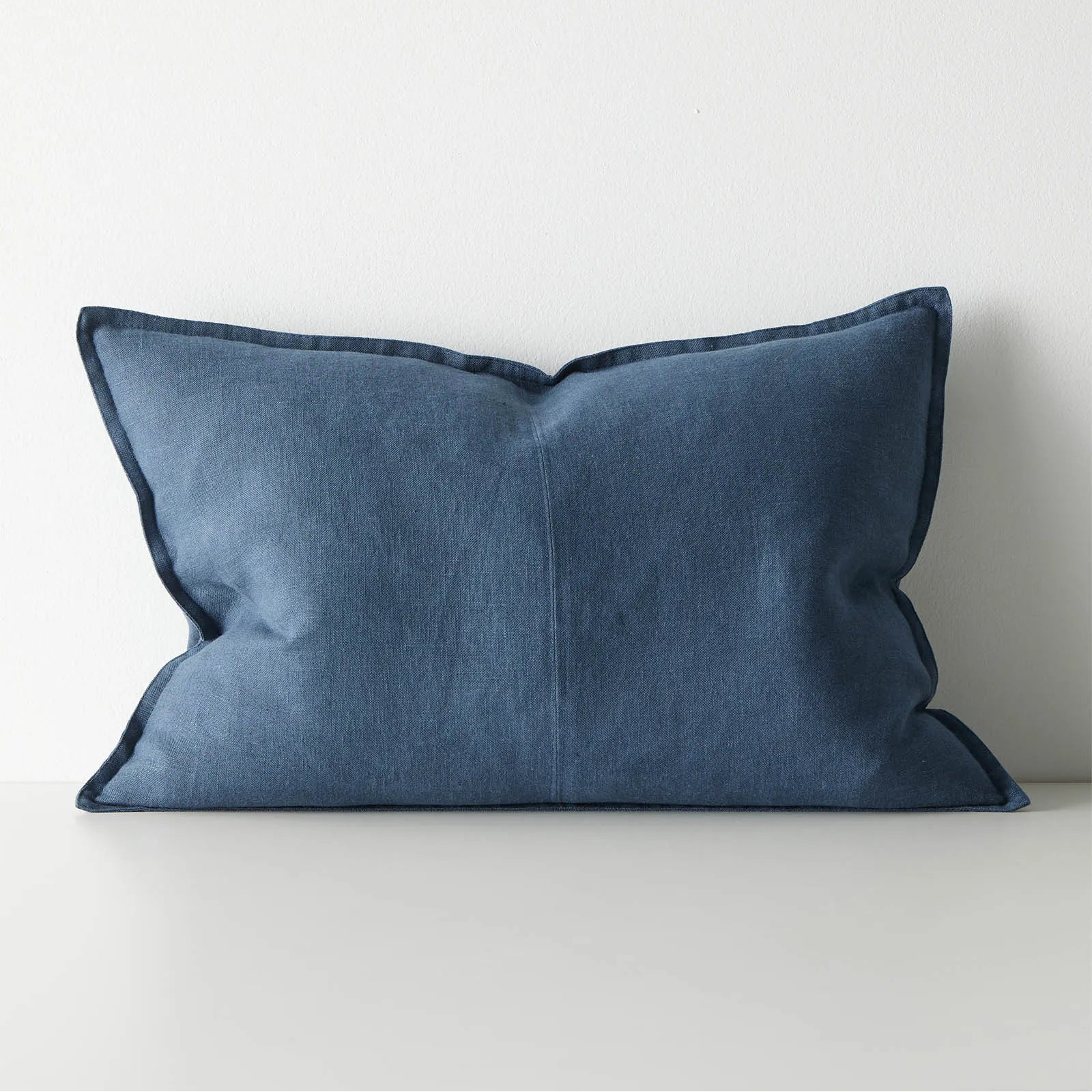 Blue pillow on a white background