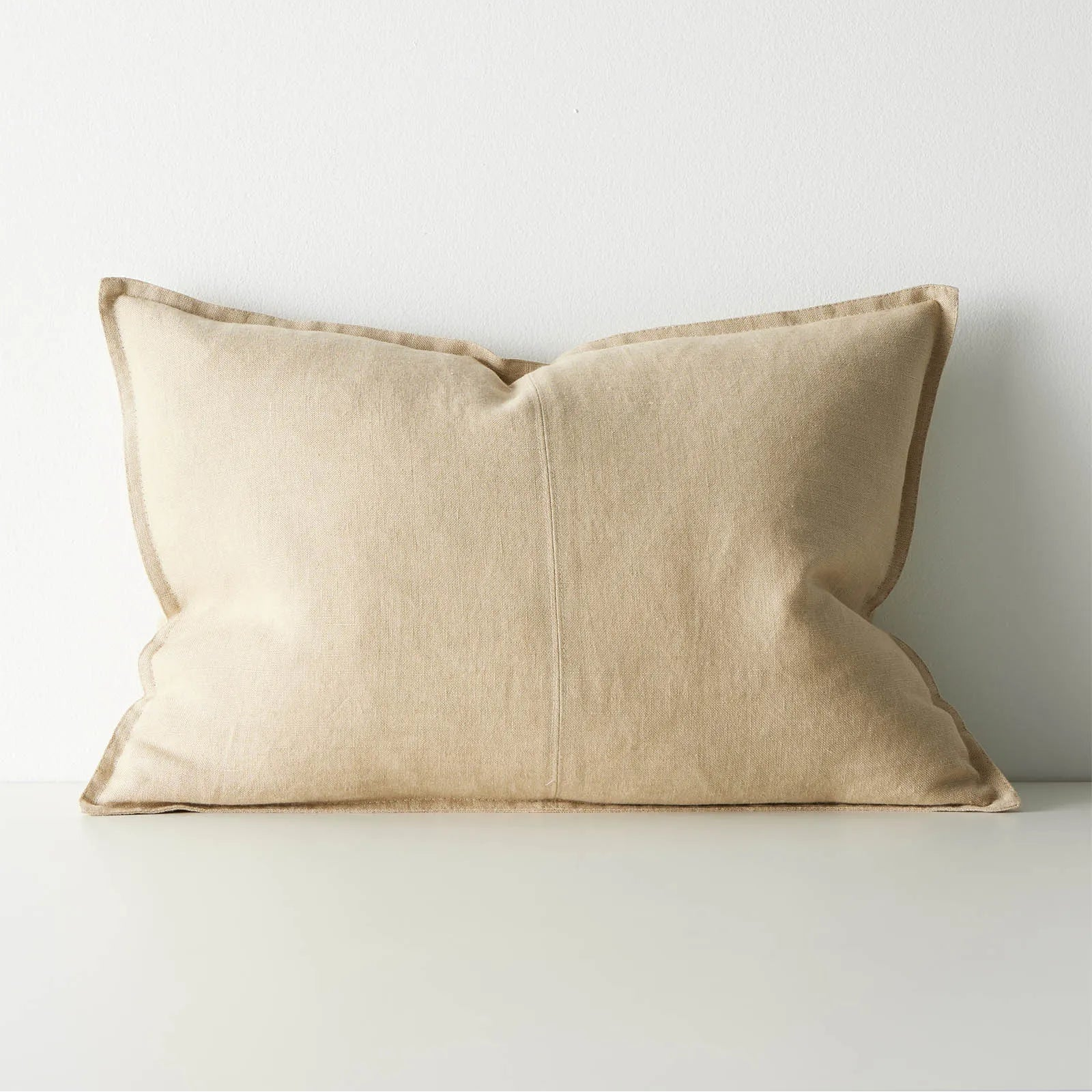 Beige cushion on a white background