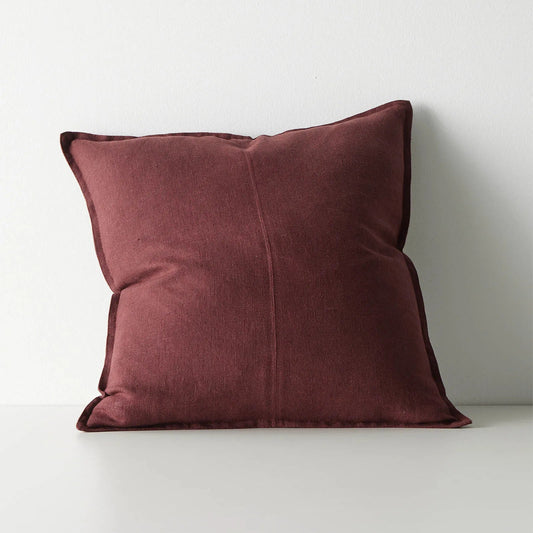 Maroon pillow on a white background