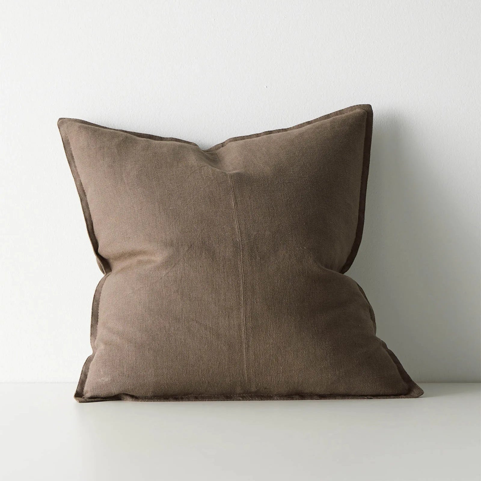 Brown cushion on white background