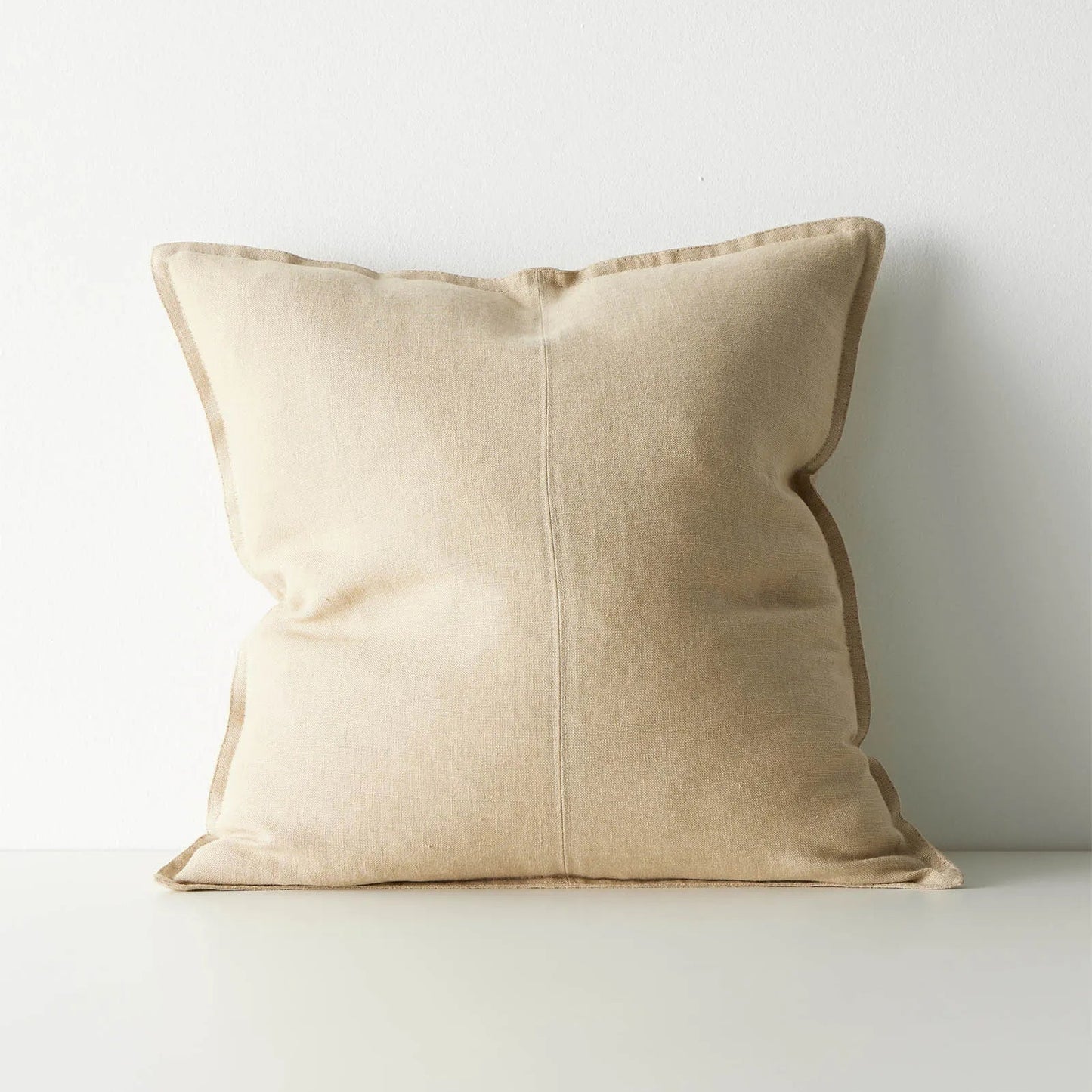 Beige cushion on a white background