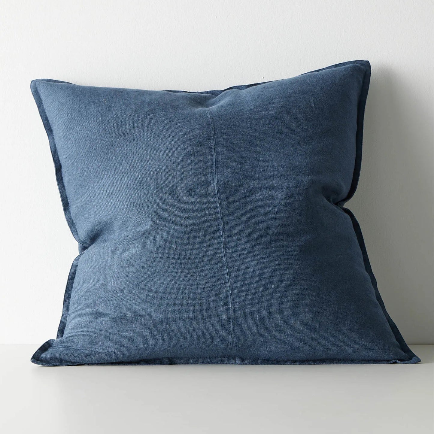 Blue pillow on a white background