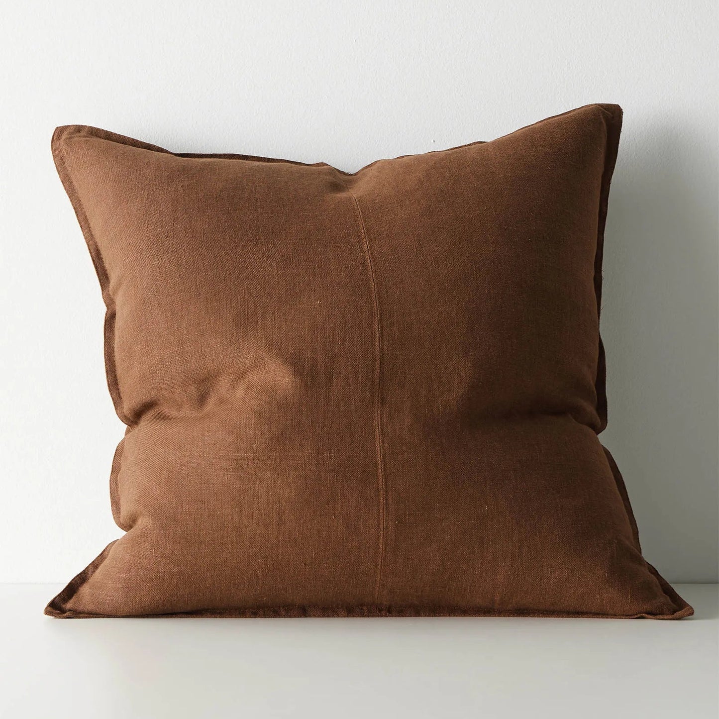 Brown cushion on a white background