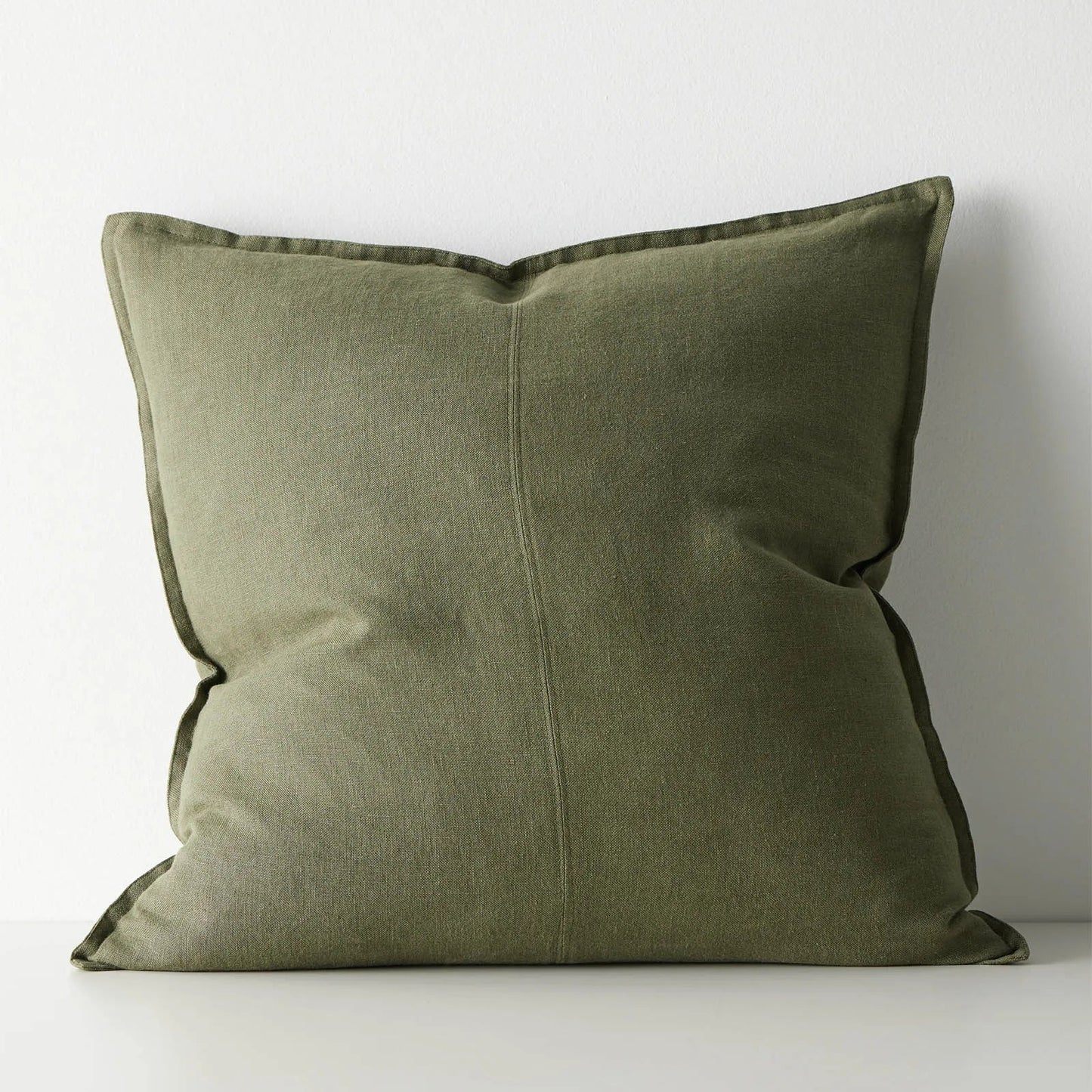 Green pillow on a white background