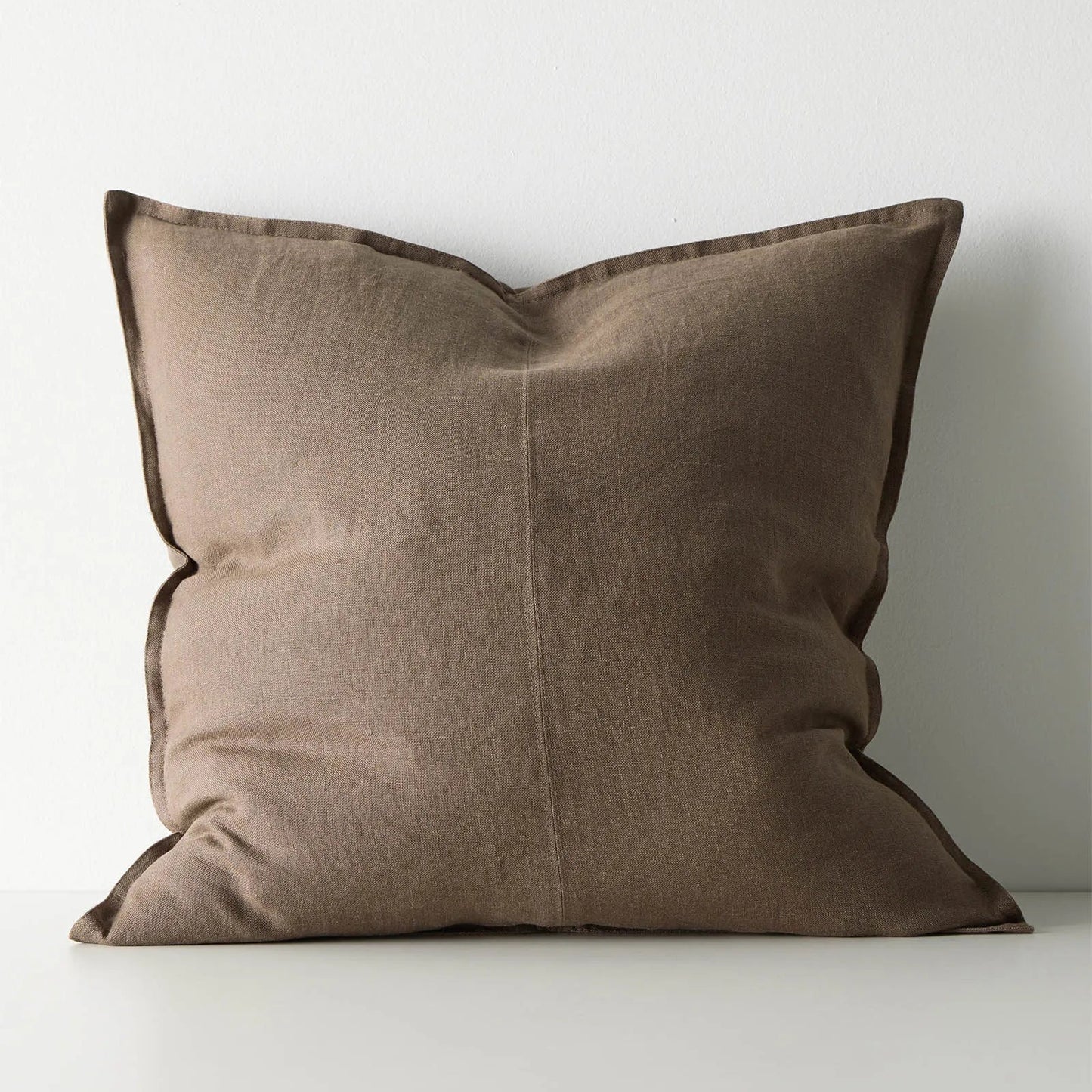 Brown cushion on white background