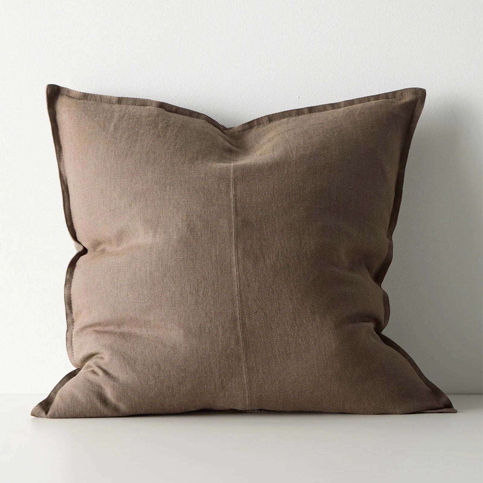Brown cushion on white background
