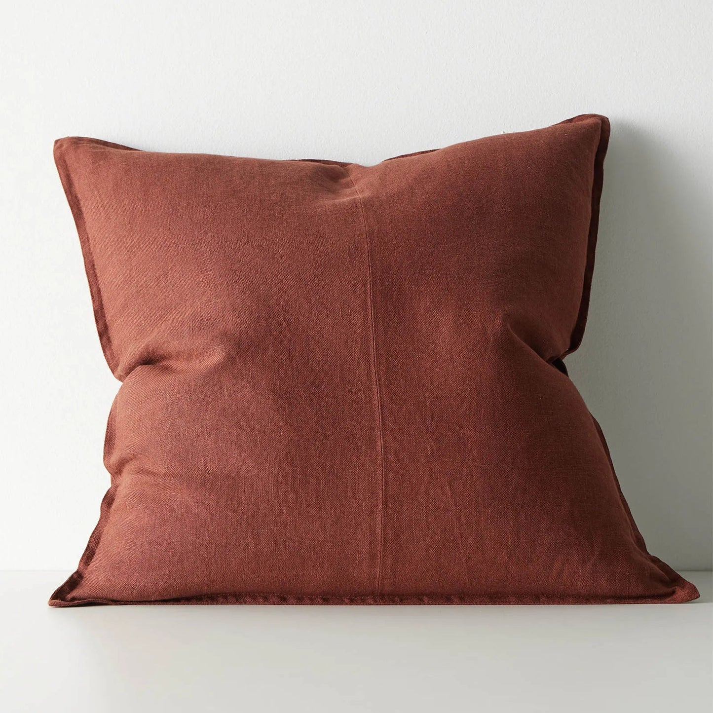 Brown red cushion on a white background