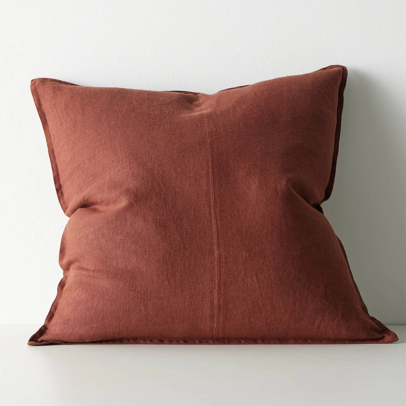 Brown red cushion on a white background