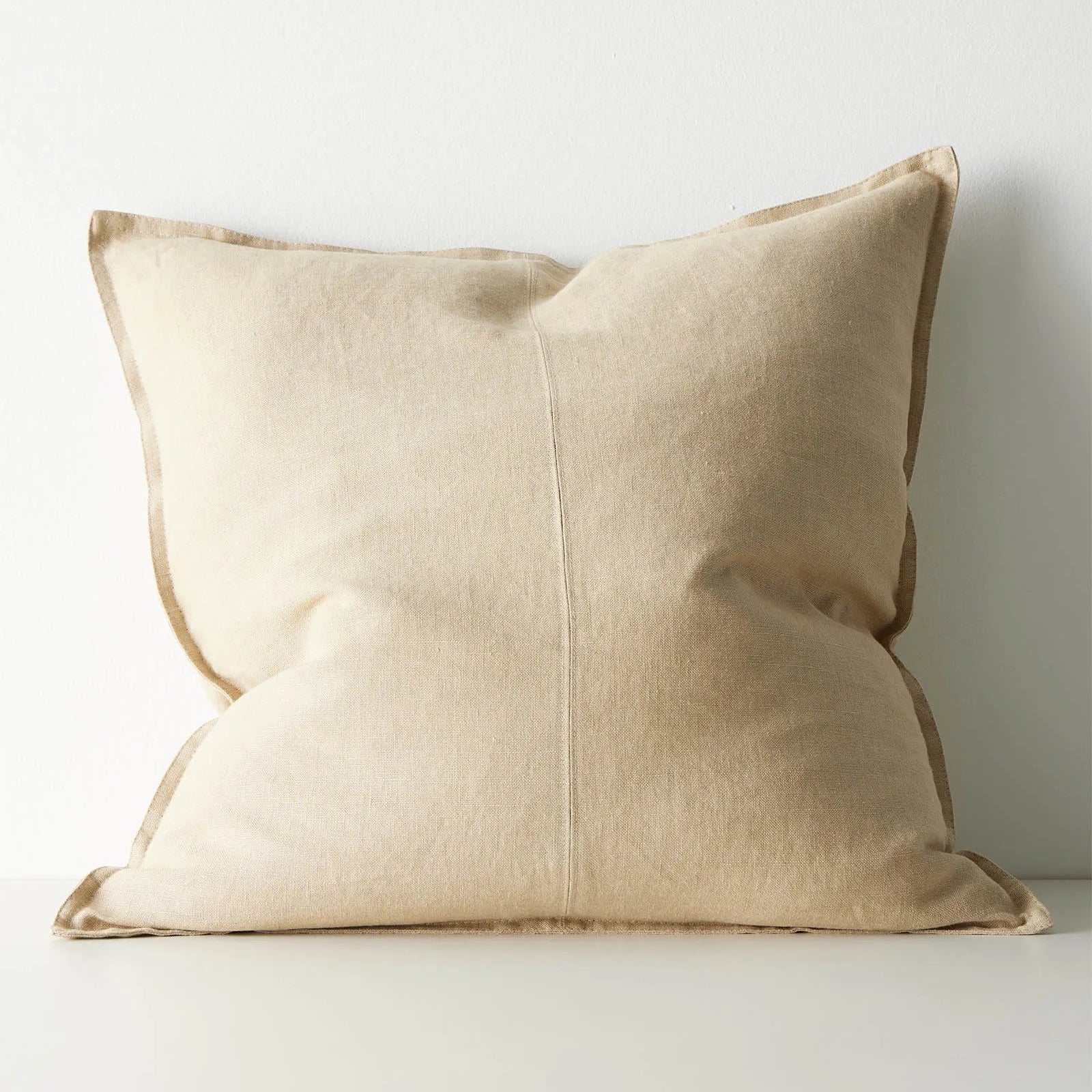 Beige cushion on a white background