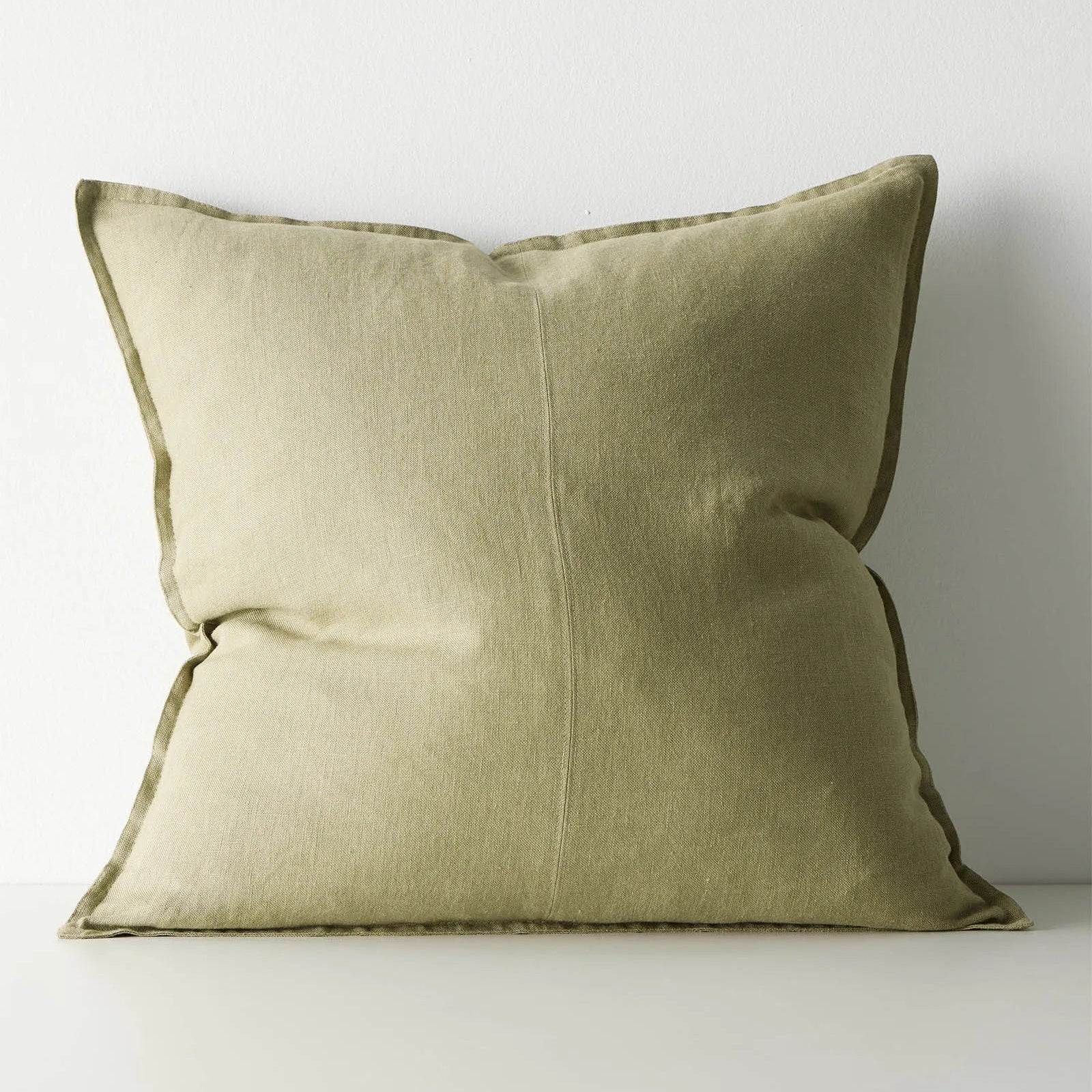 Green cushion on a white background