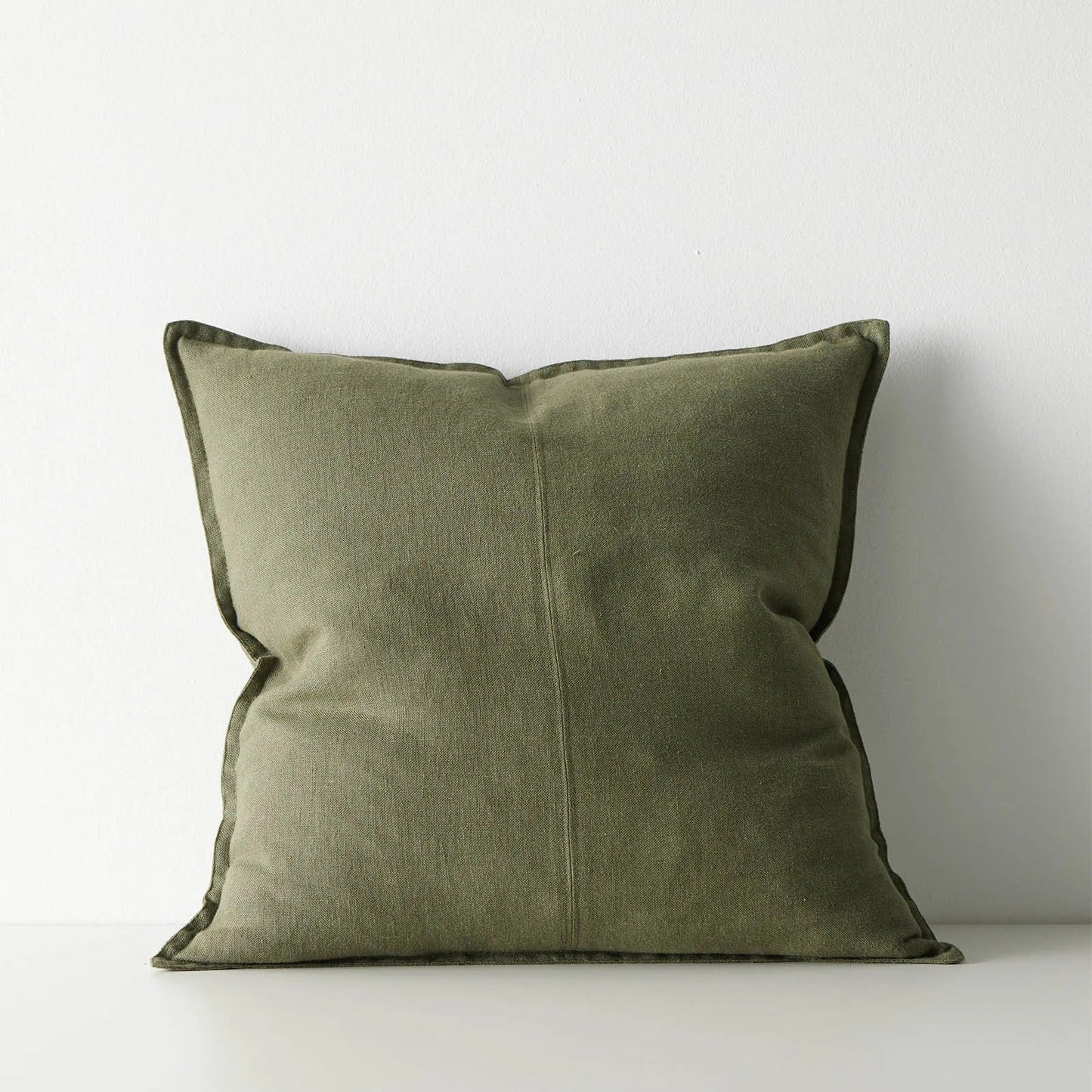 Green pillow on a white background
