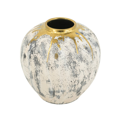 Decorative vase with gold accents on a white background