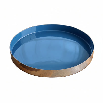 Blue round tray with gold rim on a white background