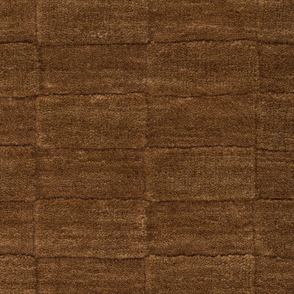 Close up of Toffee coloured textured floor rug 