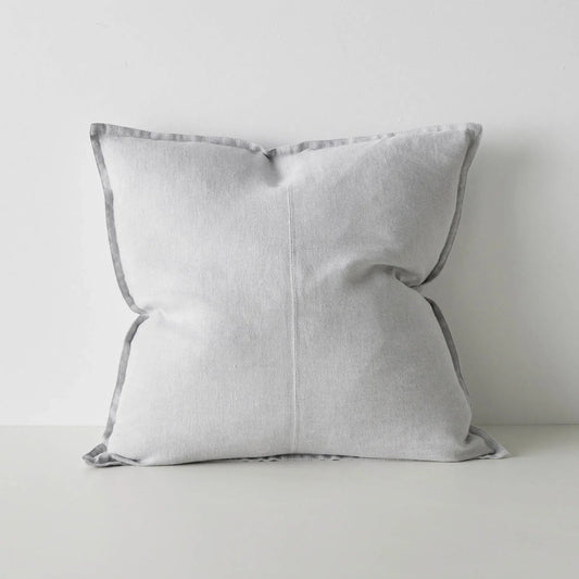 Light grey cushion on a light grey background