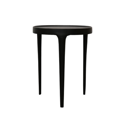 A minimalist black side table with a circular top and three tapered legs, shown against a solid white background.