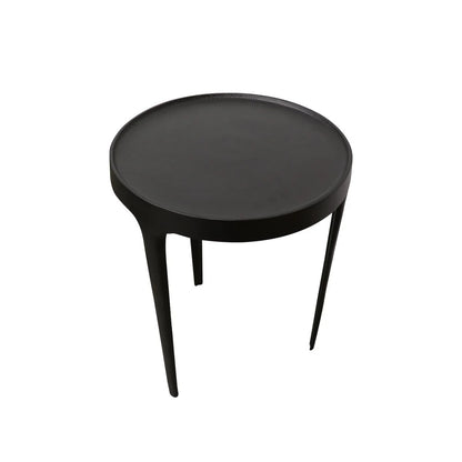 Black round side table on a white background