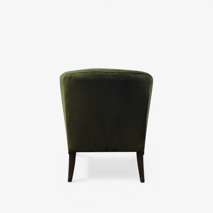 An olive green velvet armchair shown from the back, featuring dark wooden legs, set against a plain white background.