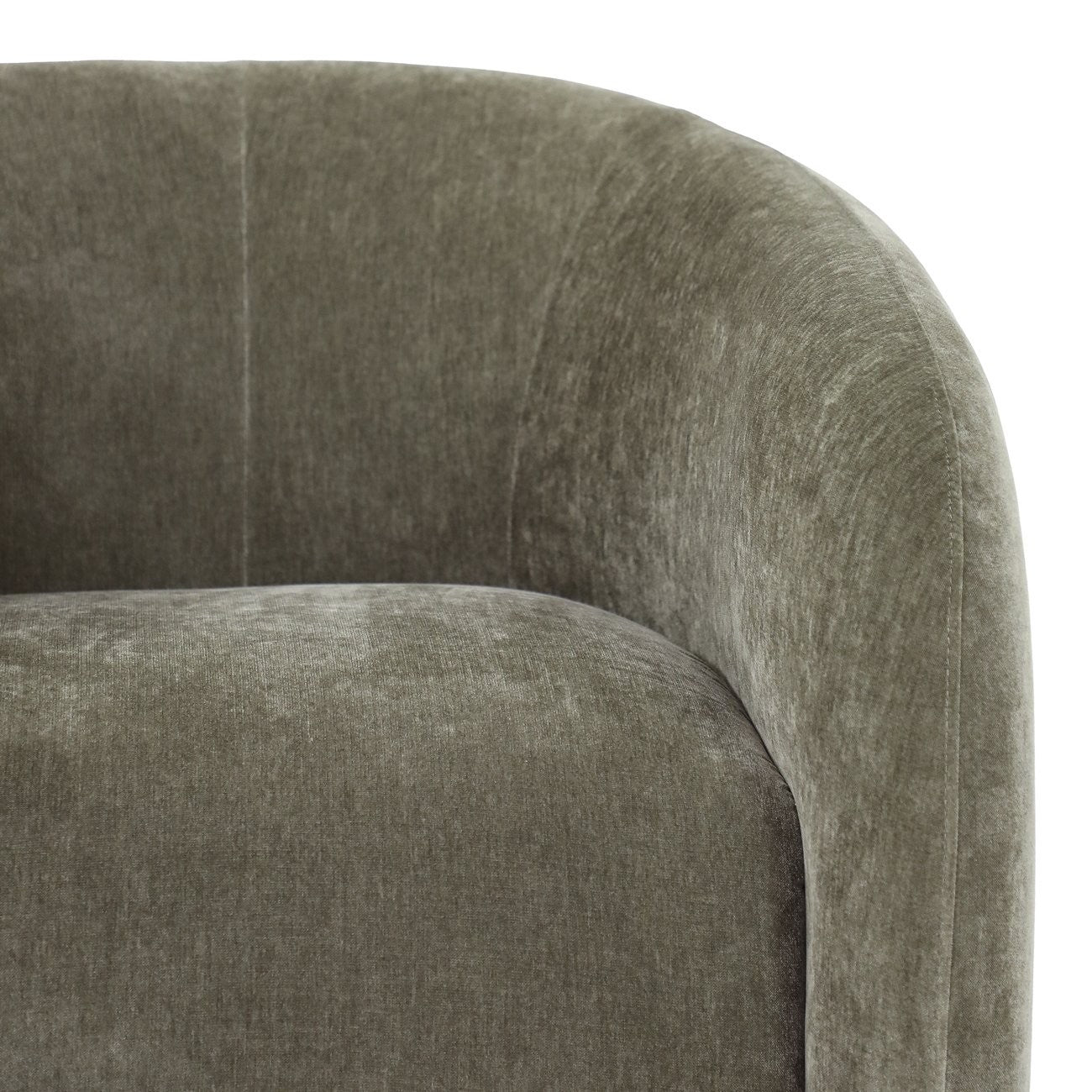 Close-up of a moss velvet armchair arm on a white background