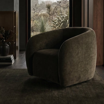 moss armchair in a room with a window view of plants