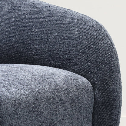 Close-up of a textured steel blue chair with a white background
