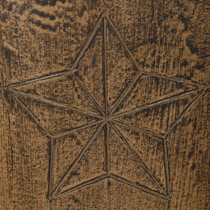 Star-shaped design on a textured brown surface of Nomad Cabinet
