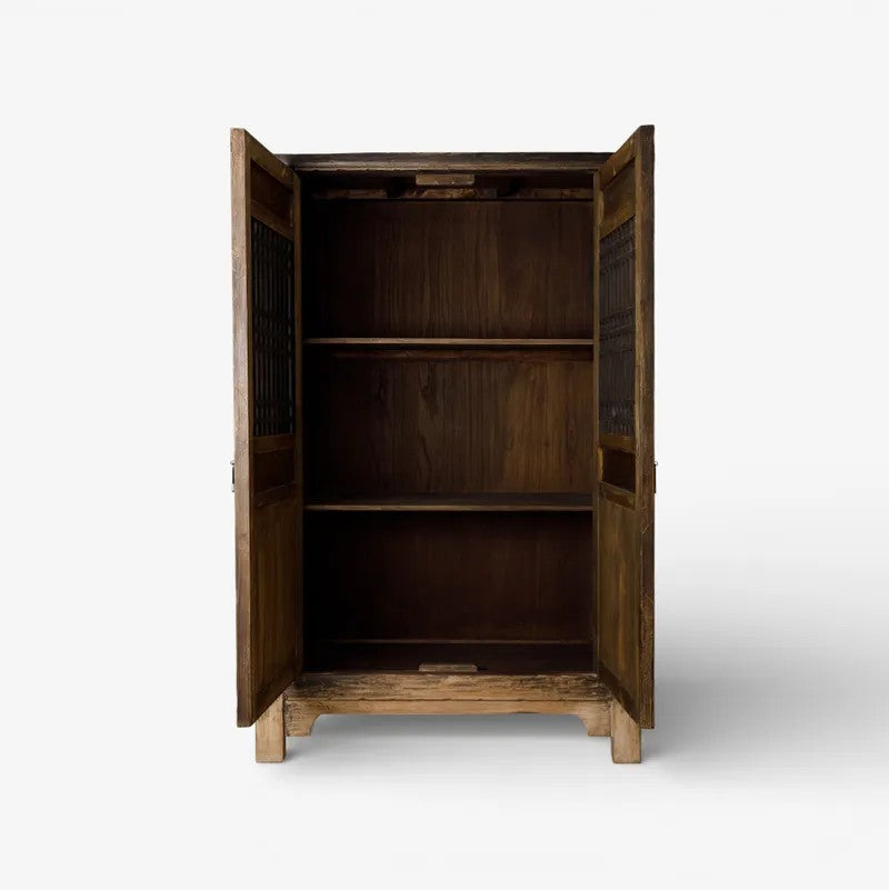 Nomad wooden cabinet with open doors on a white background