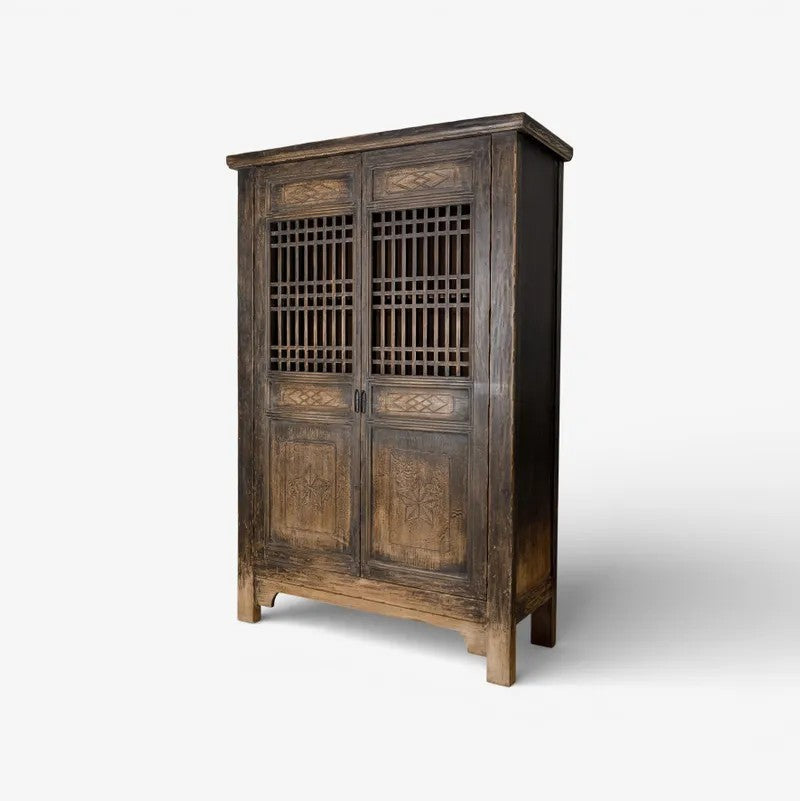 Nomad vintage wooden cabinet with lattice design on a white background