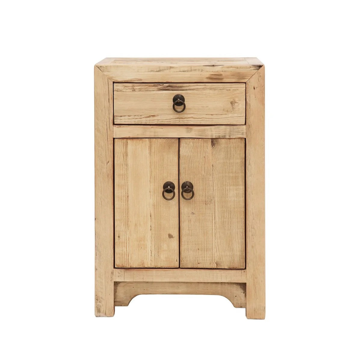 A small rustic wooden Bedside cabinet with one drawer and two doors, featuring dark metal ring pulls, set against a plain white background.
