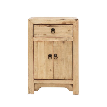 A small rustic wooden Bedside cabinet with one drawer and two doors, featuring dark metal ring pulls, set against a plain white background.